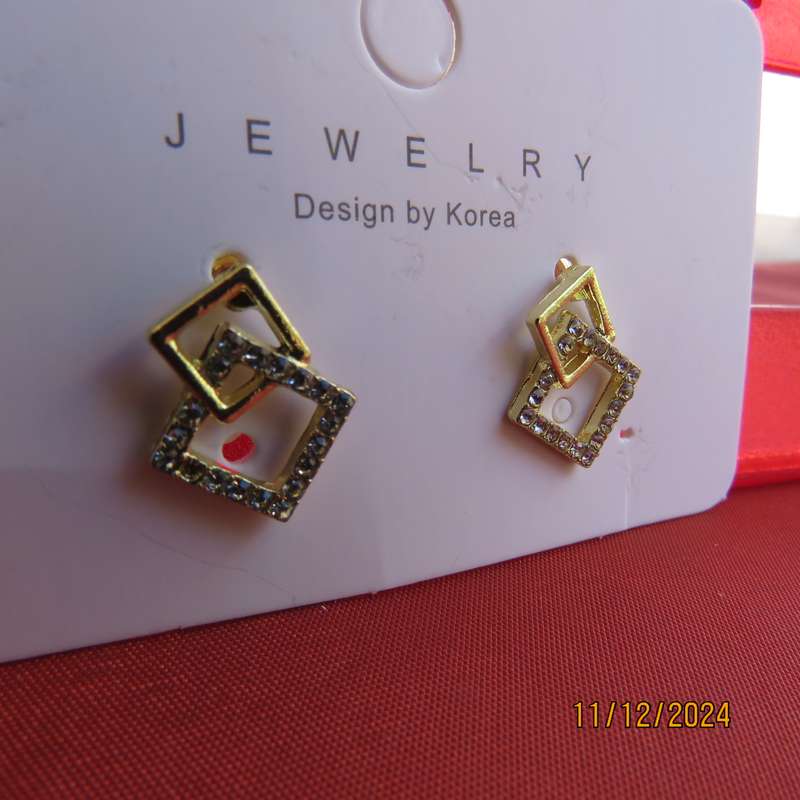 Tiny little gold square earrings with faux diamond stones. Glam factor. New item