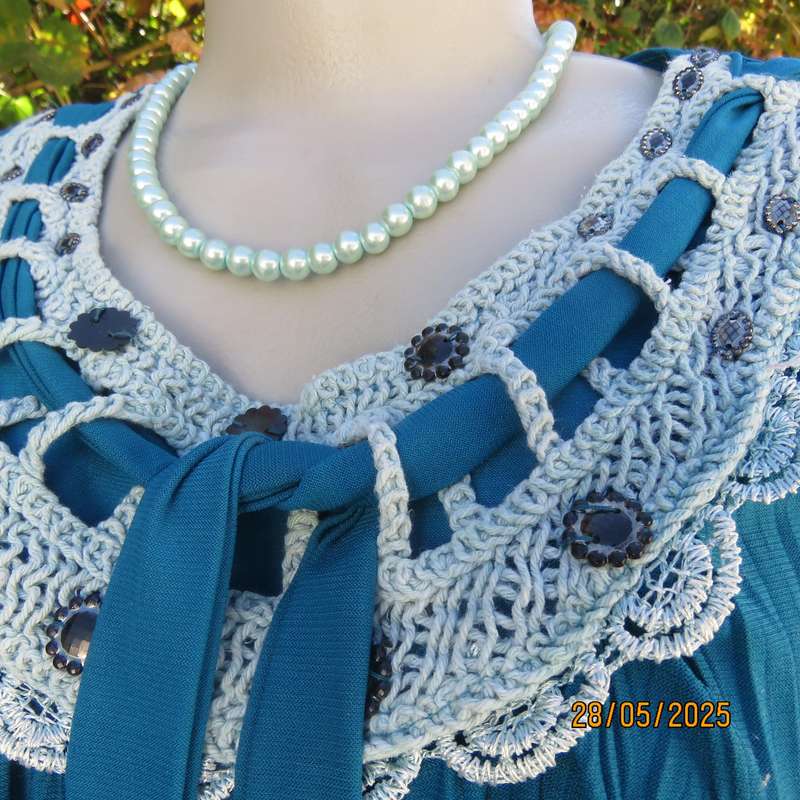 Jade loose hanging long sleeve slip over permanent vertical patterned size 36-38 top.