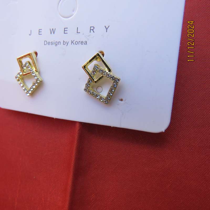 Tiny little gold square earrings with faux diamond stones. Glam factor. New item