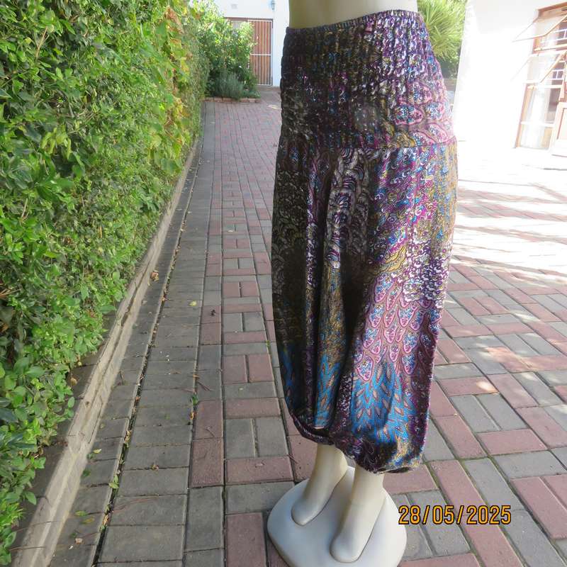 Harem pants in jewel colours with peacock feather patterns. Silky poly-rayon. Size 34-36.