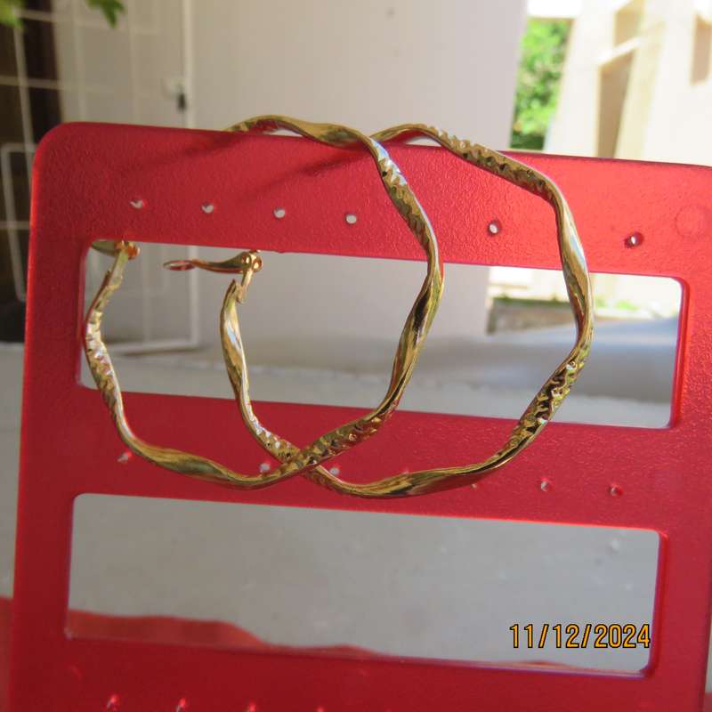 Pair of golden hoop earrings with curls and decoration. Diam. 5cm. New item.