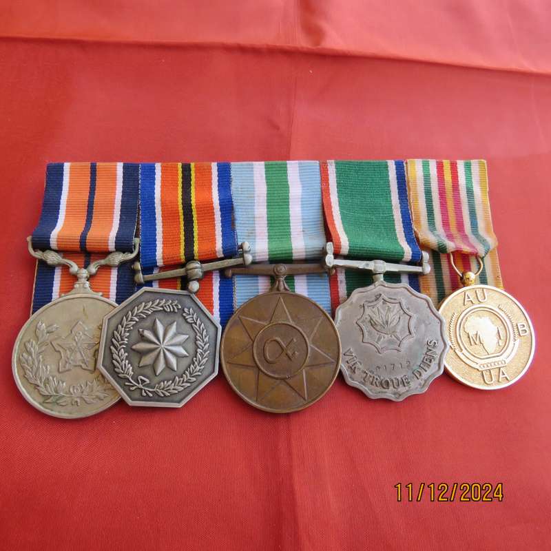 Set of 4 SADF medals with ribbons plus AU medal Burundi. All excellent condition.