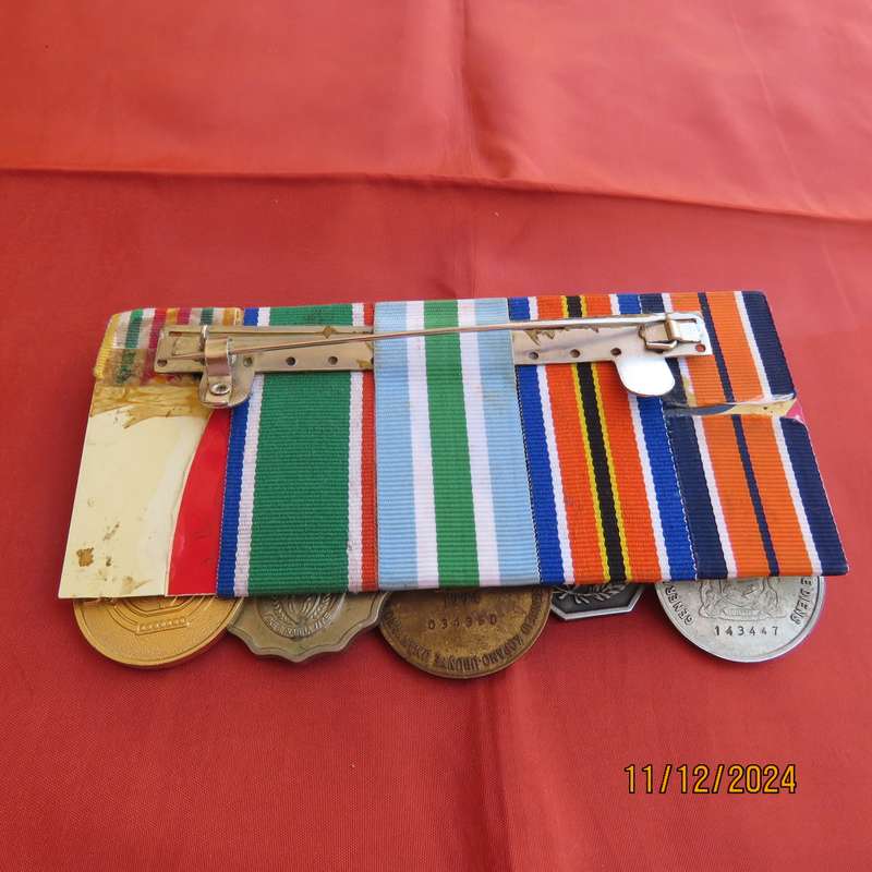 Set of 4 SADF medals with ribbons plus AU medal Burundi. All excellent condition.