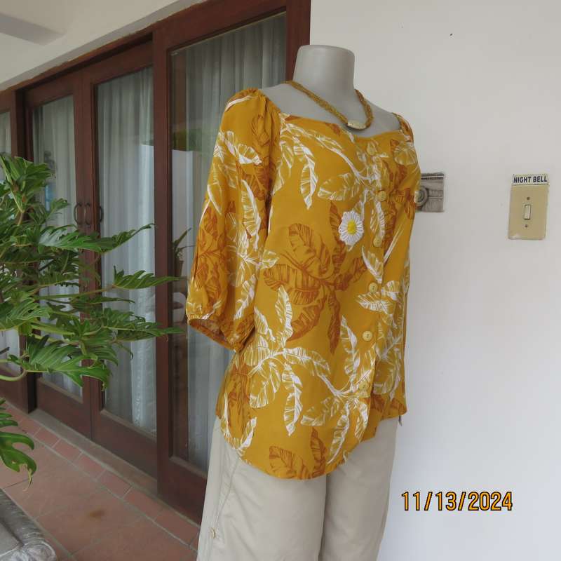Summertime chic mustard with white-rust leaf design slip over top. Size 42 by RED. Off the shoulder