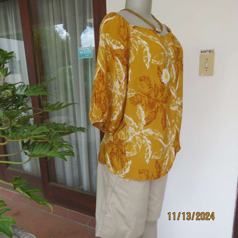Summertime chic mustard with white-rust leaf design slip over top. Size 42 by RED. Off the shoulder
