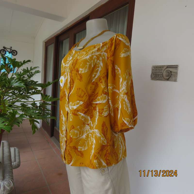 Summertime chic mustard with white-rust leaf design slip over top. Size 42 by RED. Off the shoulder