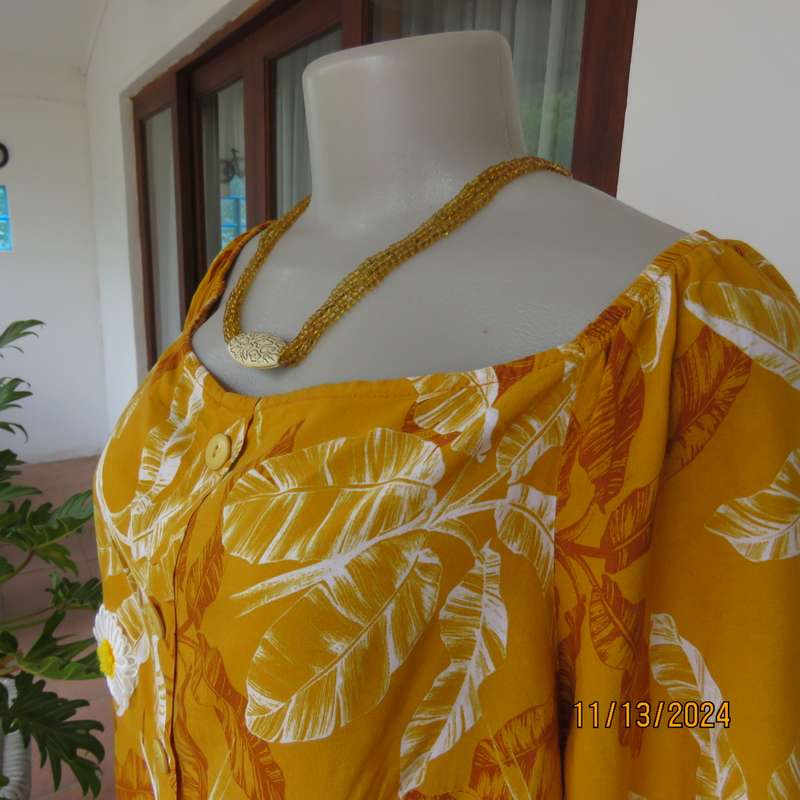 Summertime chic mustard with white-rust leaf design slip over top. Size 42 by RED. Off the shoulder