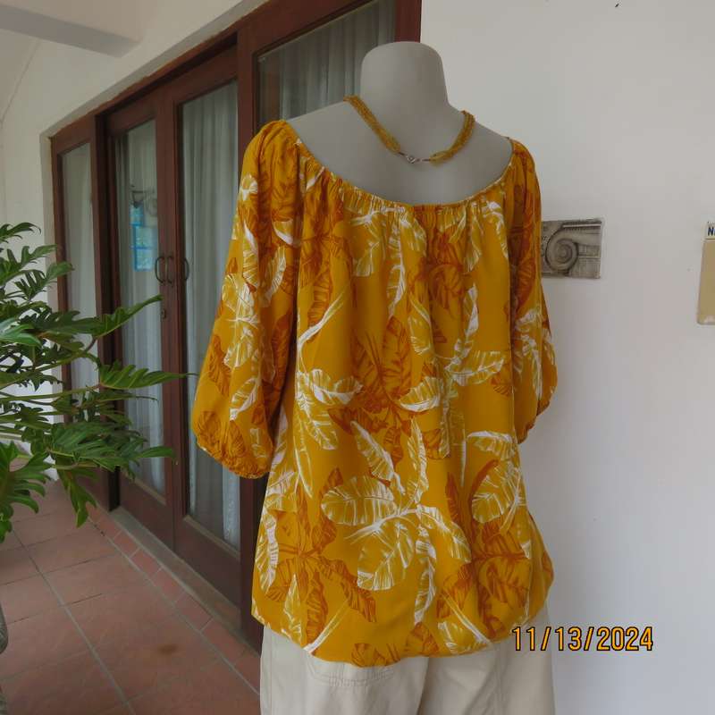 Summertime chic mustard with white-rust leaf design slip over top. Size 42 by RED. Off the shoulder