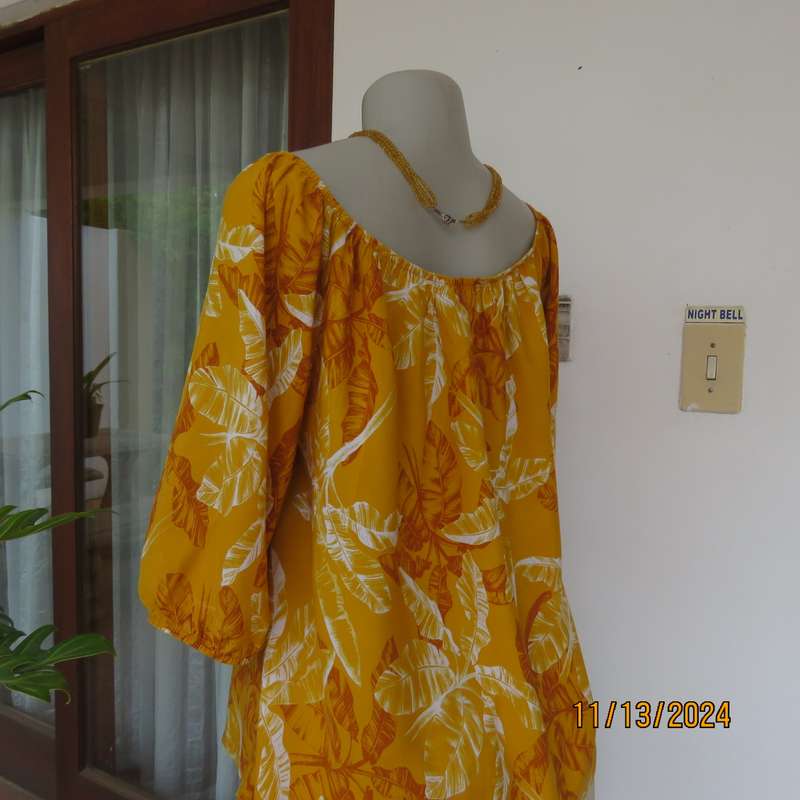 Summertime chic mustard with white-rust leaf design slip over top. Size 42 by RED. Off the shoulder