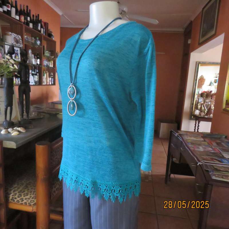 Jade green slip over textured polyester top with lace seam decoration. Size 36.