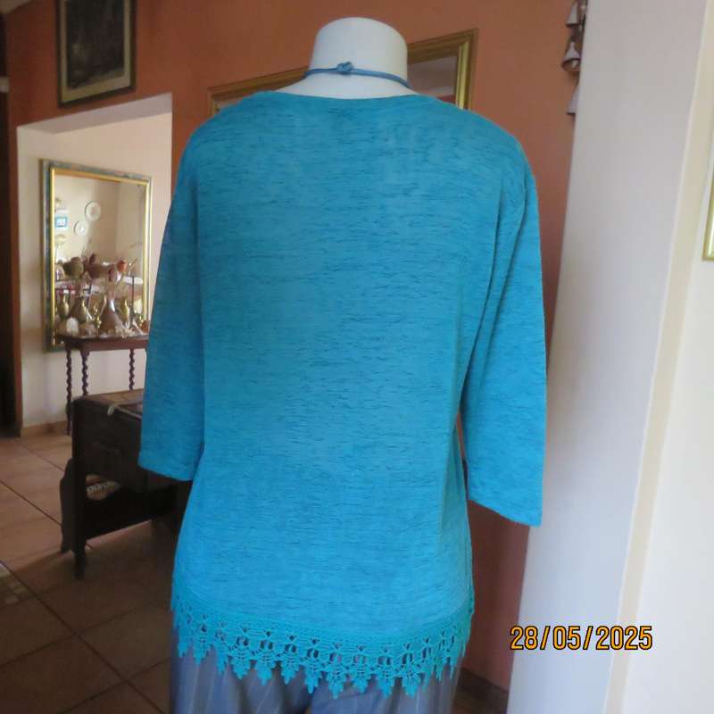Jade green slip over textured polyester top with lace seam decoration. Size 36.
