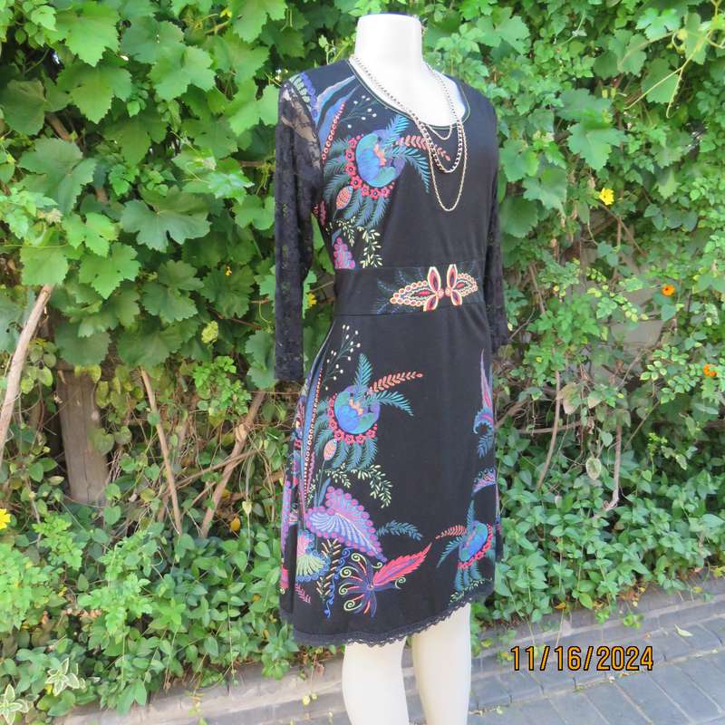 Smart casual black stretch polycotton slip over dress. Lace sleeves. Size 36-38. Jewel colour print.
