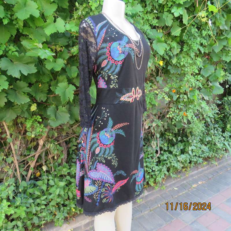 Smart casual black stretch polycotton slip over dress. Lace sleeves. Size 36-38. Jewel colour print.