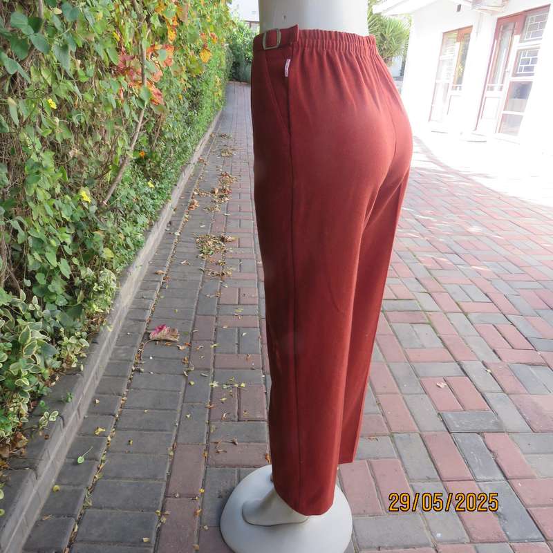 SPORTS CAR high quality rust colour tapered leg warm wash and care pants. Size 12