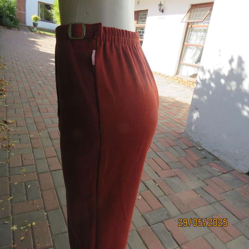 SPORTS CAR high quality rust colour tapered leg warm wash and care pants. Size 12