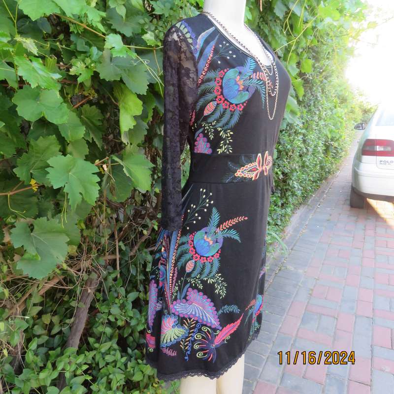 Smart casual black stretch polycotton slip over dress. Lace sleeves. Size 36-38. Jewel colour print.