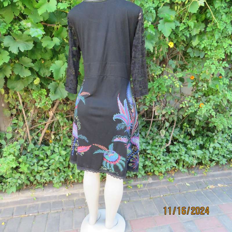 Smart casual black stretch polycotton slip over dress. Lace sleeves. Size 36-38. Jewel colour print.