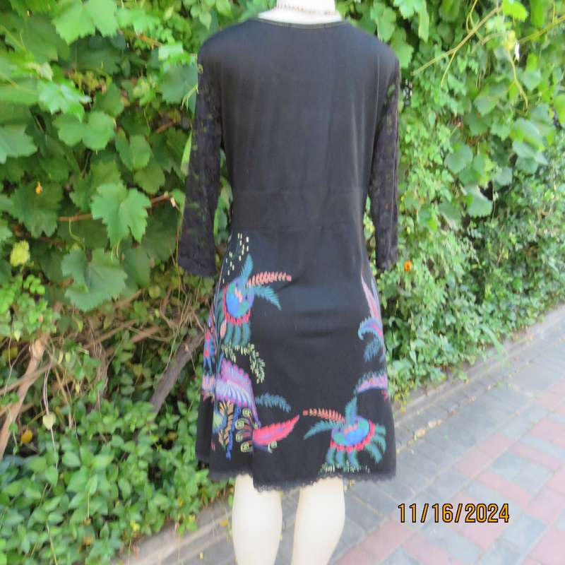 Smart casual black stretch polycotton slip over dress. Lace sleeves. Size 36-38. Jewel colour print.