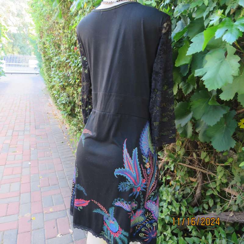 Smart casual black stretch polycotton slip over dress. Lace sleeves. Size 36-38. Jewel colour print.