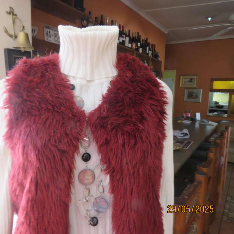 Burgundy faux fur polyester waistcoat with lining. Size 30 to 32. As new