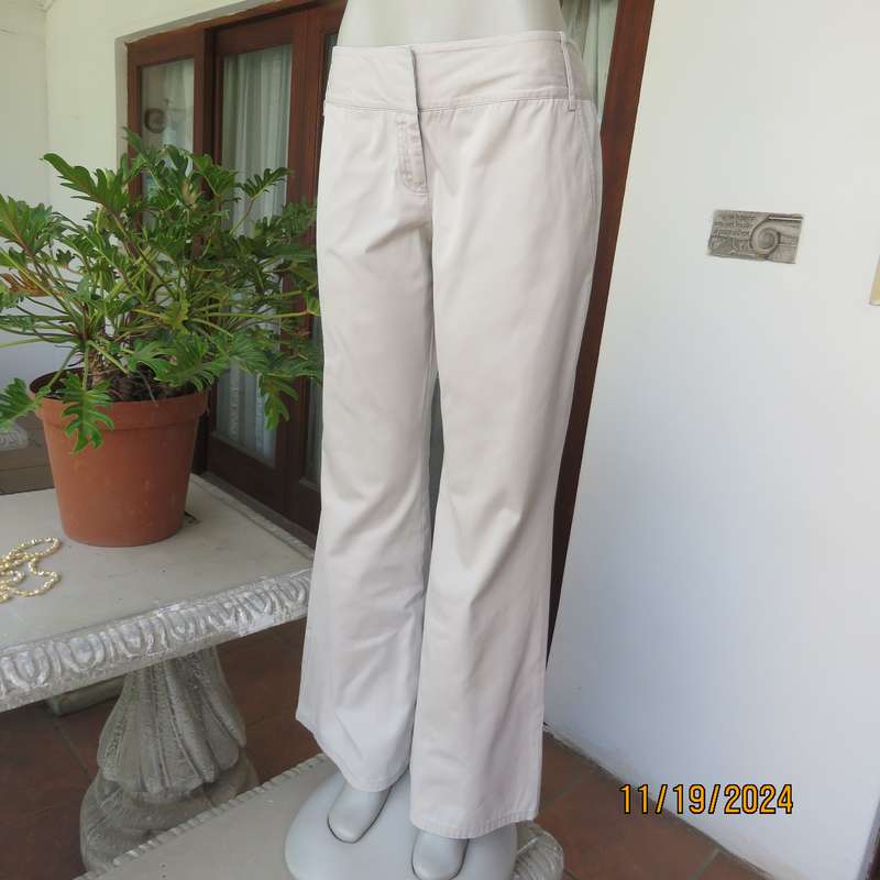 WOOLWORTHS top of the line bootlegged beige cotton pants size 36.Pockets back-front. As new