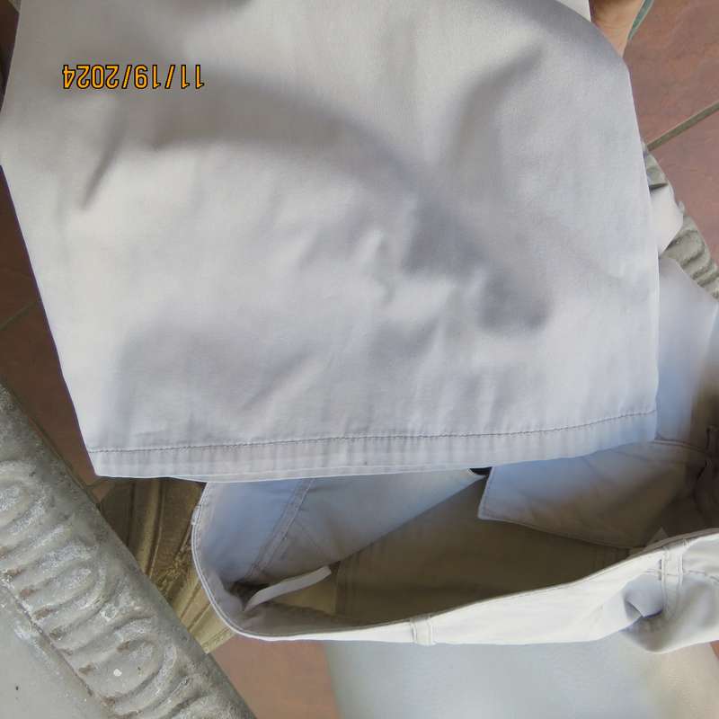 WOOLWORTHS top of the line bootlegged beige cotton pants size 36.Pockets back-front. As new