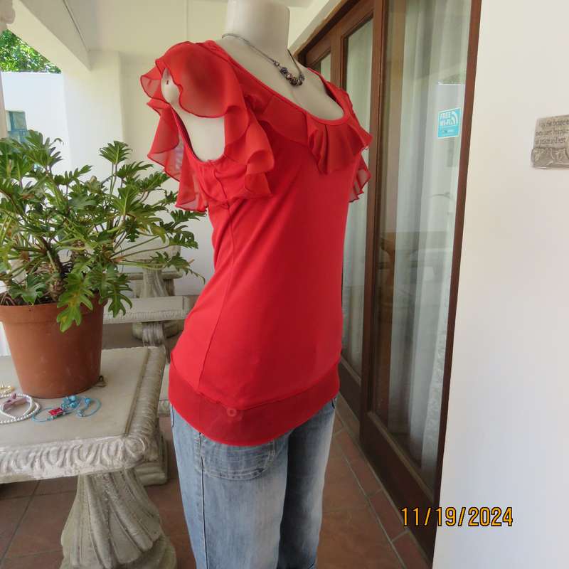 Pretty red slip over poly-rayon stretch top. Scooped frilled neckline and armholes.Size 32. Good con