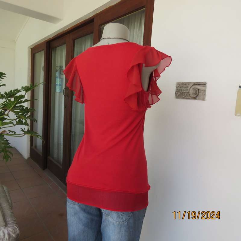 Pretty red slip over poly-rayon stretch top. Scooped frilled neckline and armholes.Size 32. Good con
