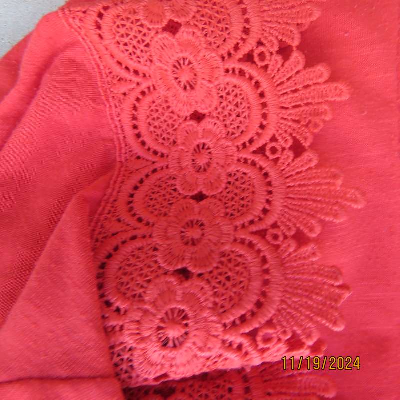 Eye catching bright red slip over polyester top. Short sleeves. Wide elasticated neckline.Size 36.