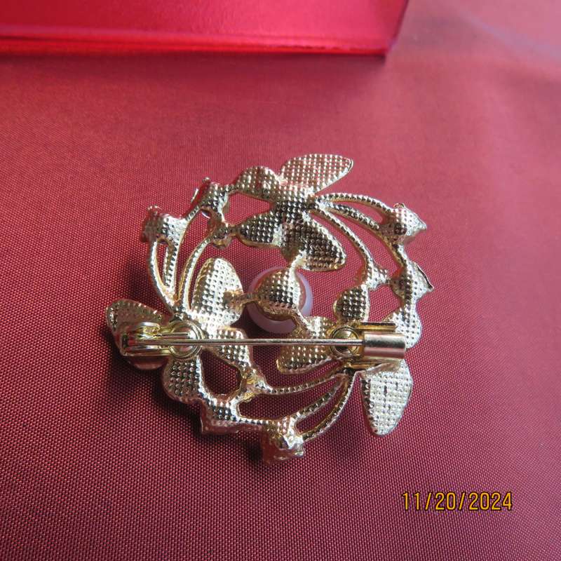 Stunning butterfly brooch 4cm diam. in gold with lots of simulated diamonds. New item.