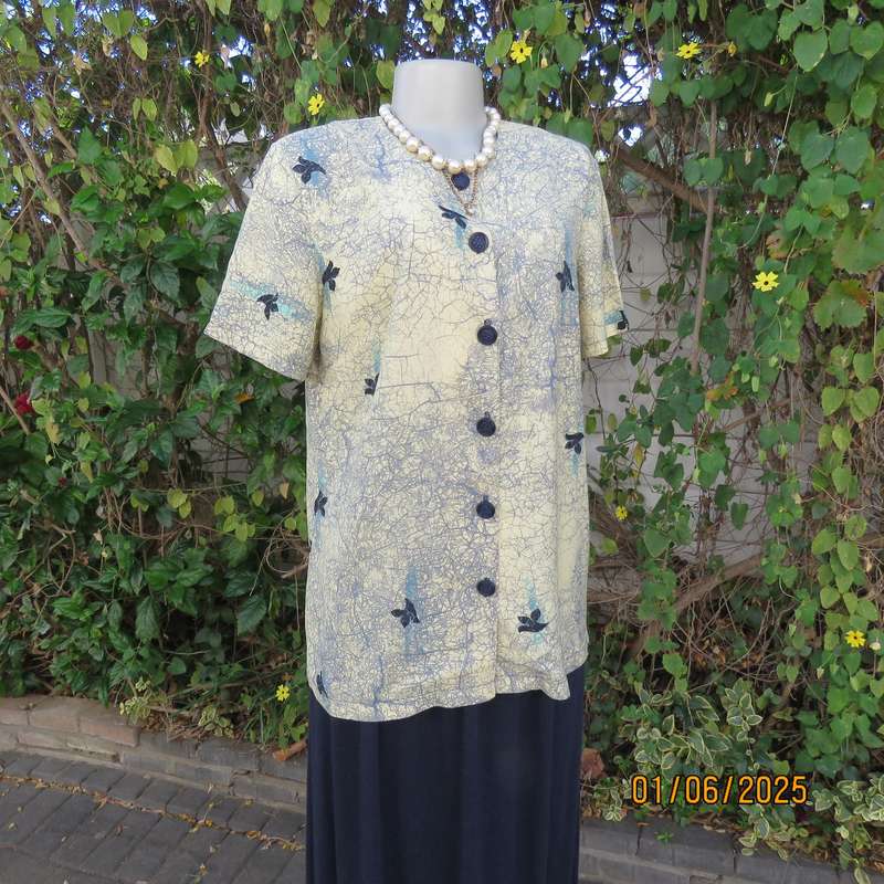 Boutique made royal cream button down collarless top. Jade vein -leaf pattern. Size 36