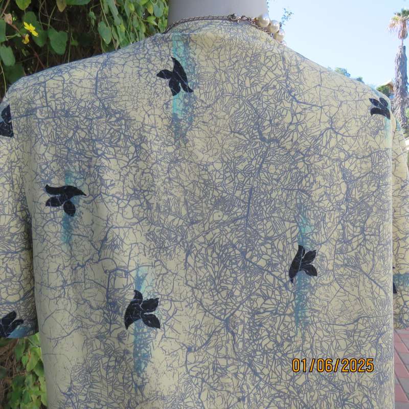 Boutique made royal cream button down collarless top. Jade vein -leaf pattern. Size 36