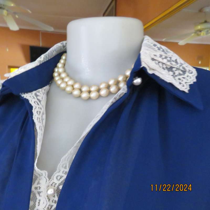 Amazing navy SHUBETTE of LONDON vintage long sleeves sheer polyester dress. Size 36.Lined.Cream lace