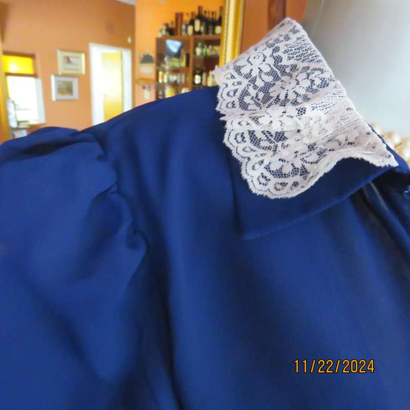 Amazing navy SHUBETTE of LONDON vintage long sleeves sheer polyester dress. Size 36.Lined.Cream lace