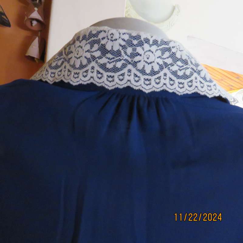 Amazing navy SHUBETTE of LONDON vintage long sleeves sheer polyester dress. Size 36.Lined.Cream lace