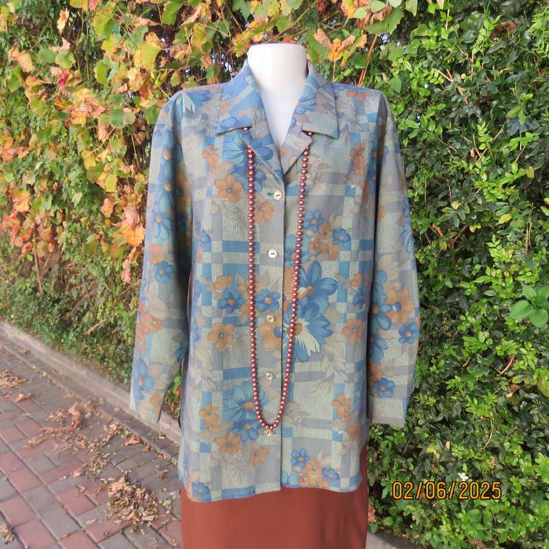 Owner made long sleeve polycotton top in blues-brown patterns. Size 42-44. Open collar