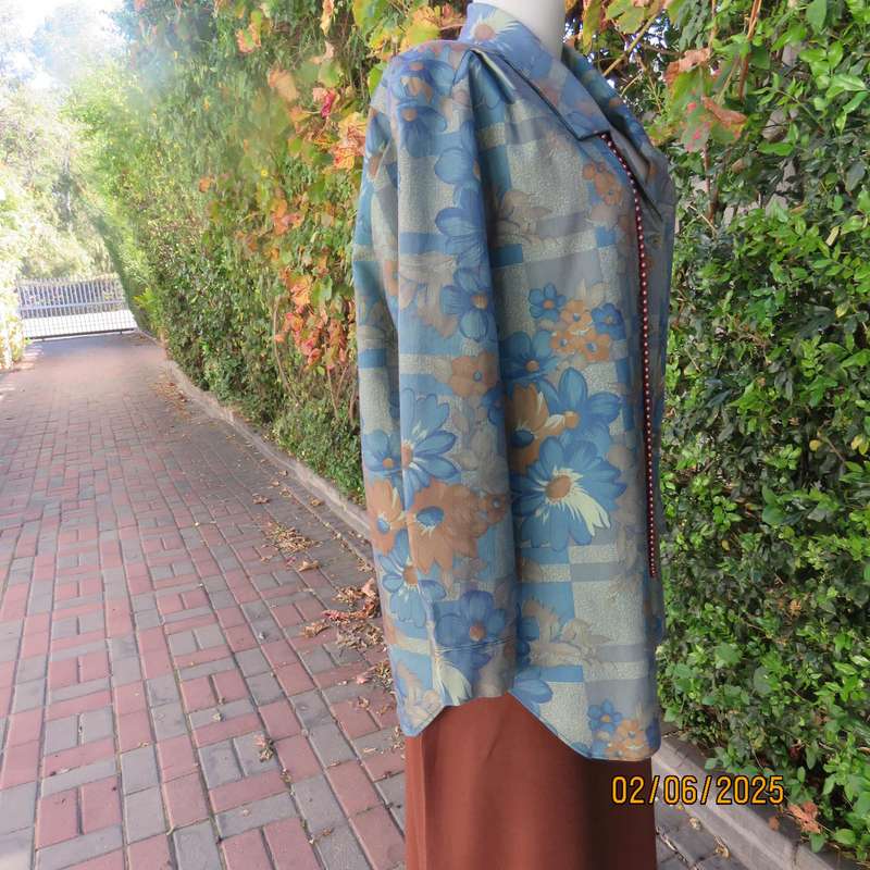 Owner made long sleeve polycotton top in blues-brown patterns. Size 42-44. Open collar