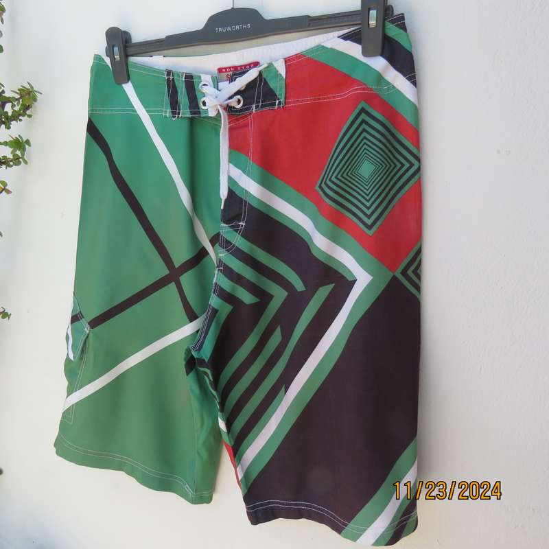 SOFICH Non Stop men's boardshorts in red-green-black and white graphic print. Size 34.As new.