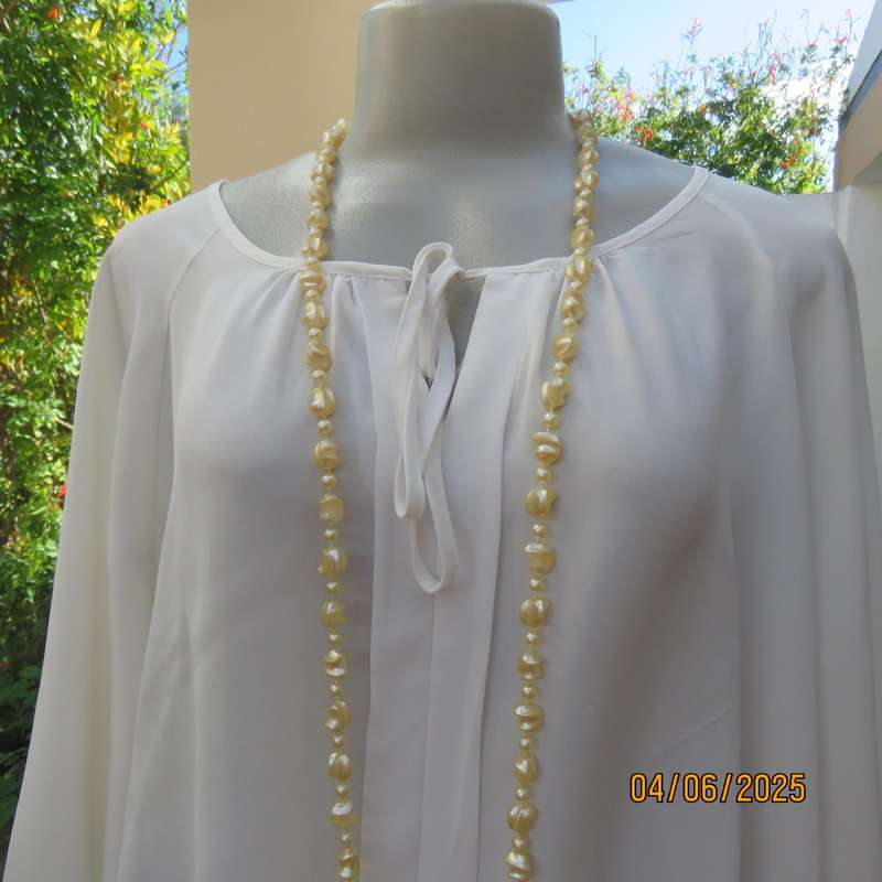 MERIEN HALL light cream polyester blouson top size 46. Threequarter sleeves.