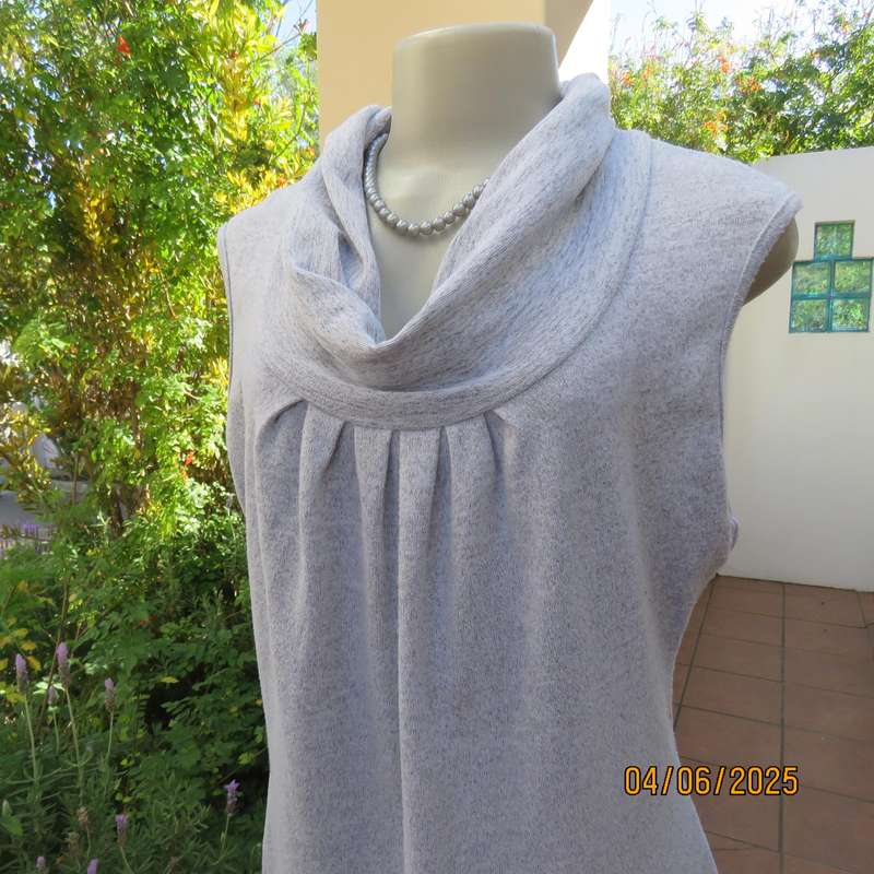 Soft stretch poly knit silvergrey long top with wide fold over collar. Size 40