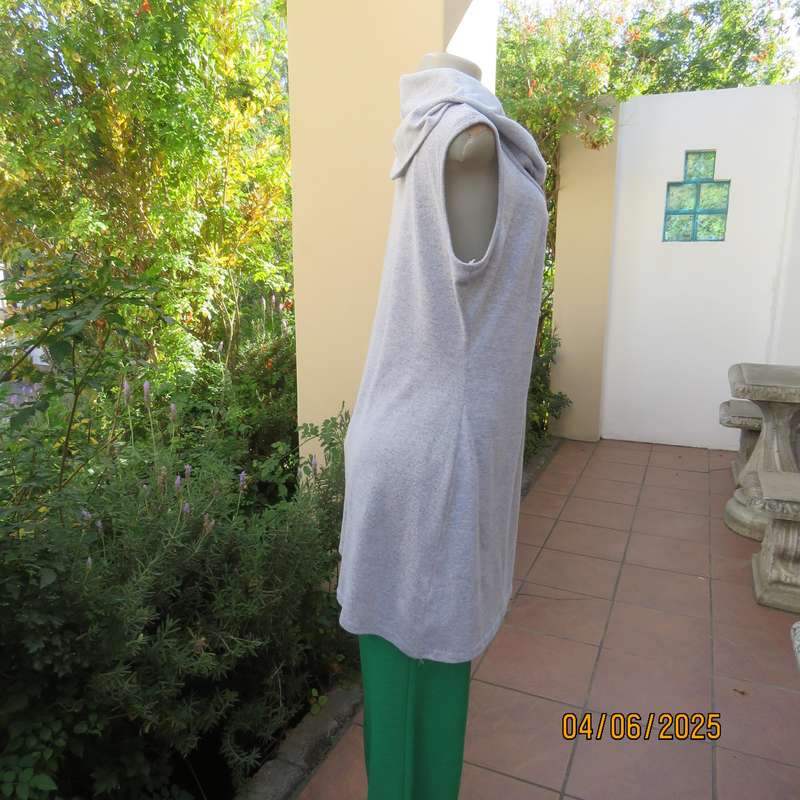 Soft stretch poly knit silvergrey long top with wide fold over collar. Size 40