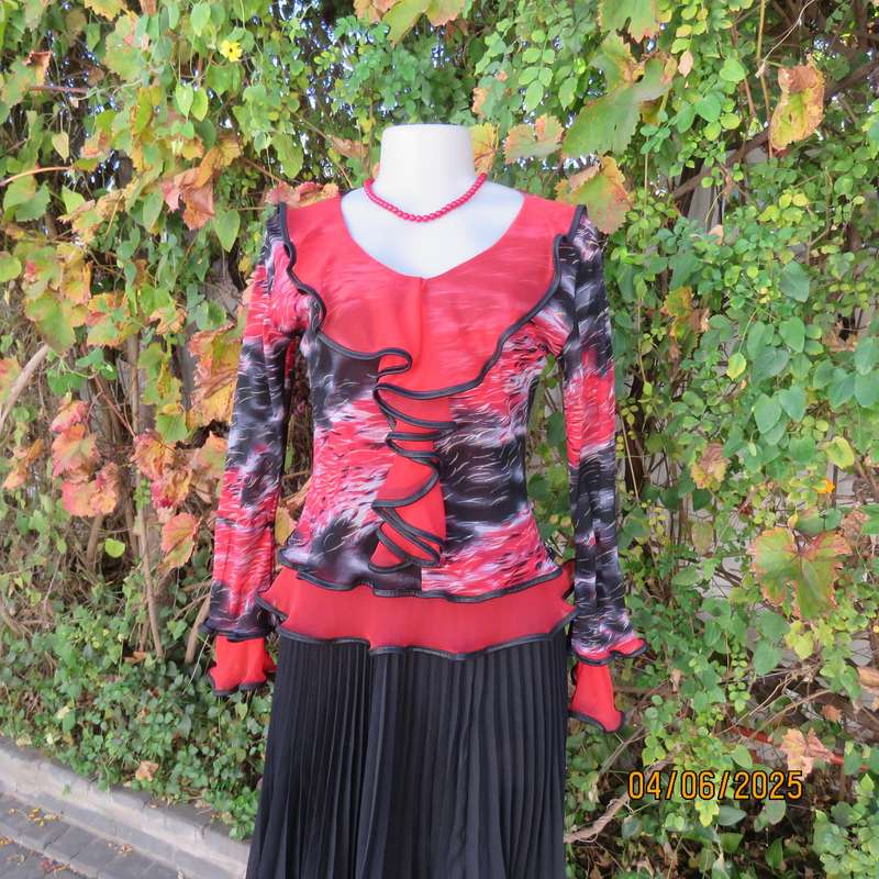 Glamour long sleeve top in red-black-grey sheer polyester. Frilled long sleeves. Size 32