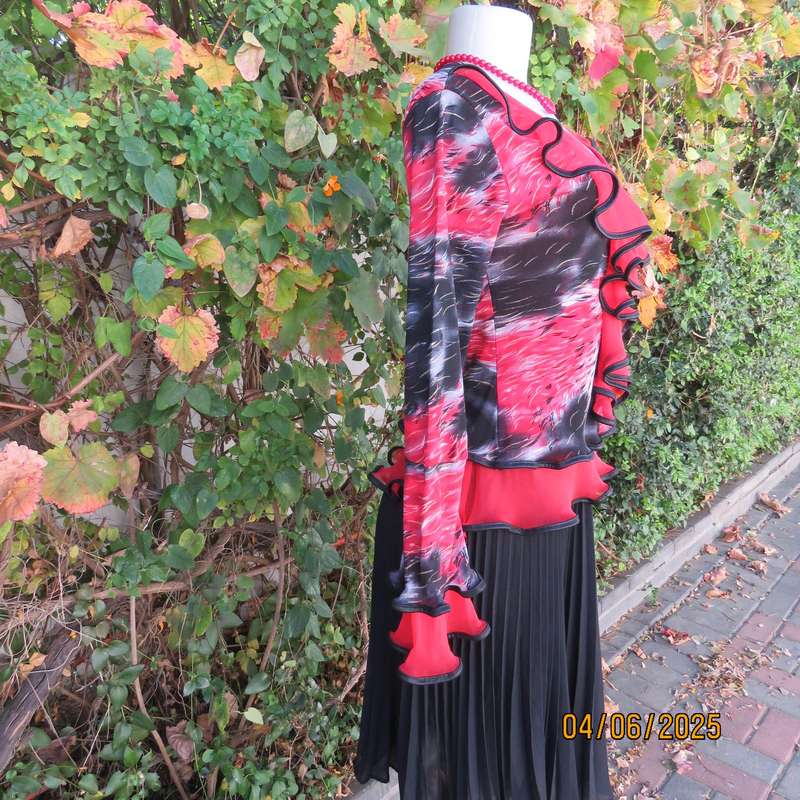 Glamour long sleeve top in red-black-grey sheer polyester. Frilled long sleeves. Size 32