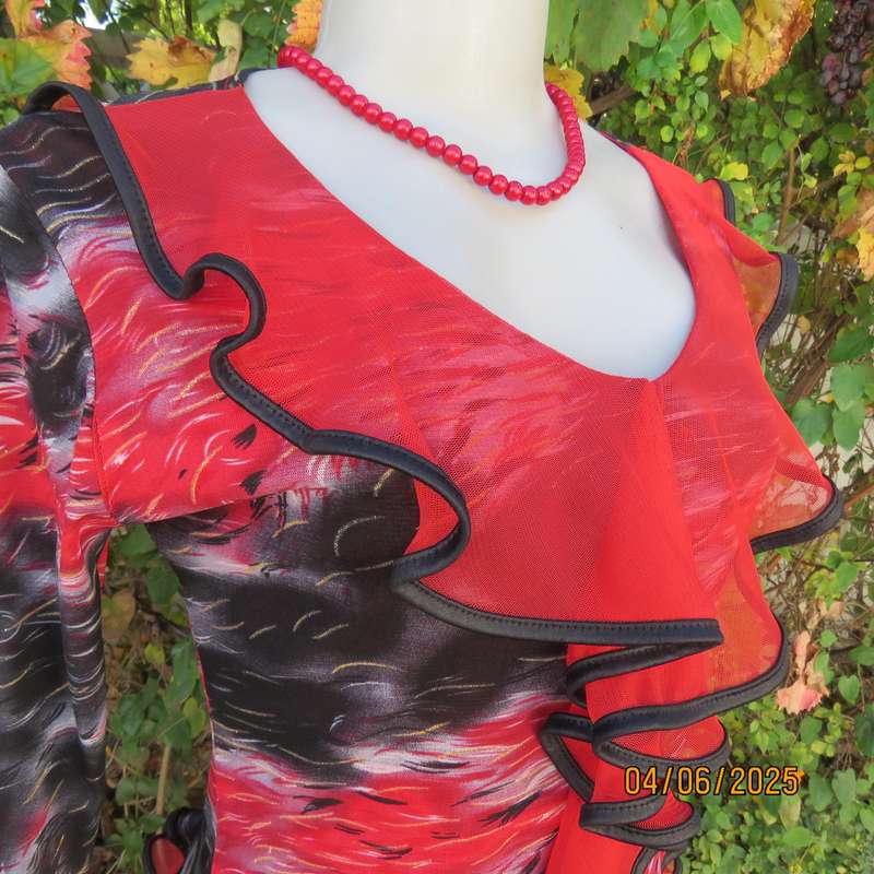 Glamour long sleeve top in red-black-grey sheer polyester. Frilled long sleeves. Size 32