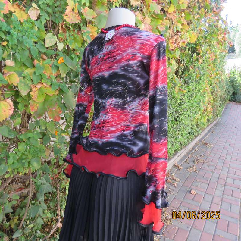 Glamour long sleeve top in red-black-grey sheer polyester. Frilled long sleeves. Size 32