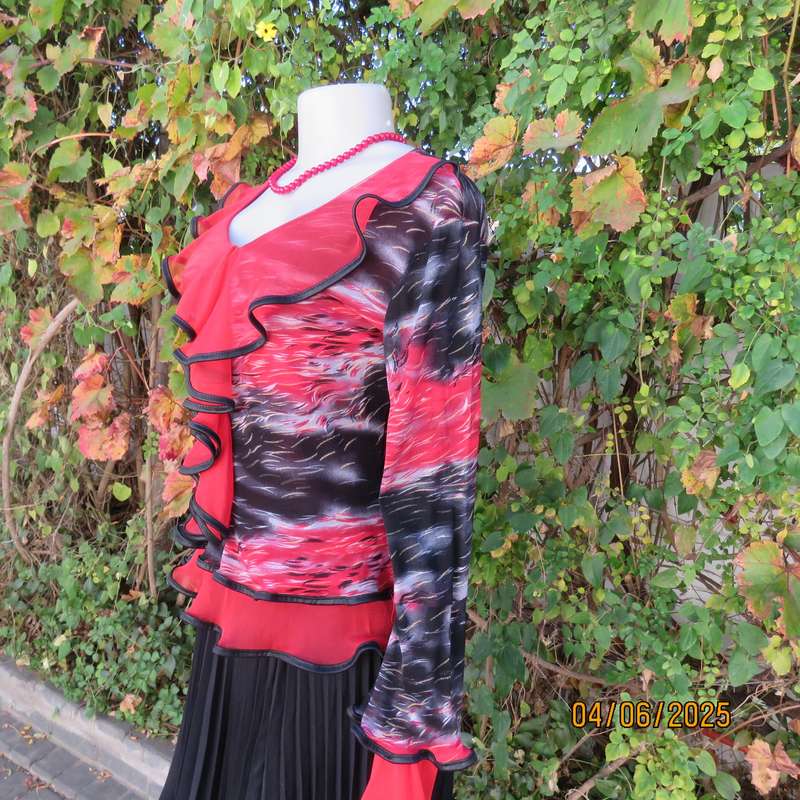Glamour long sleeve top in red-black-grey sheer polyester. Frilled long sleeves. Size 32