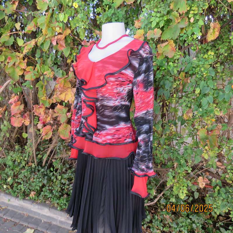 Glamour long sleeve top in red-black-grey sheer polyester. Frilled long sleeves. Size 32