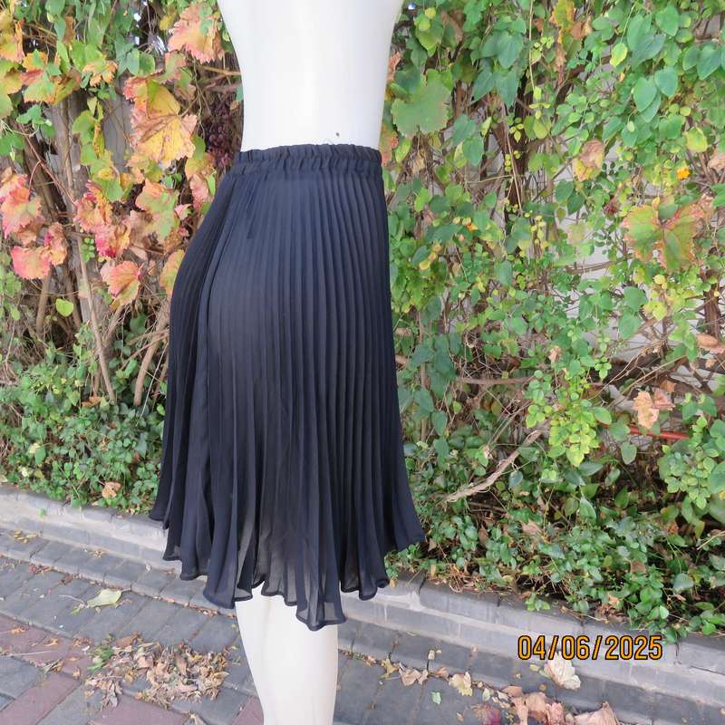 CASHWORTHS sheer polyester black permanent pleated skirt. Size 30. Elastic waist.