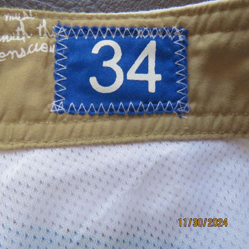 LIZZARD, as new men's white boardshorts. Golden brown-blue logo and stripes.Size 34 Breathing fabric