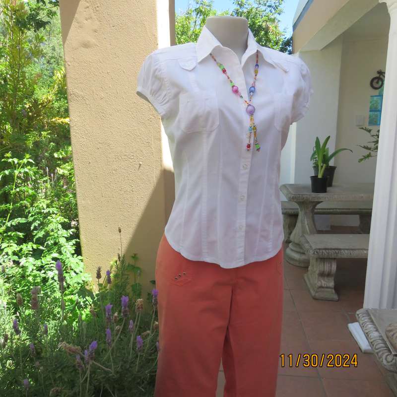 Pretty white capped sleeve button down tailored top. Cute pockets. Shirt collar. Size 38. As new